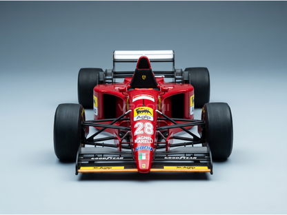 Red Ferrari scale model car with Agip and Goodyear branding, showcased by Vroomi