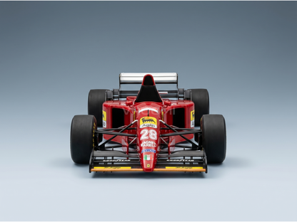 Red Ferrari F1 scale model car with Agip & Goodyear logos, displayed at Vroomi for collectors
