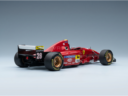 Red Ferrari scale model car with Goodyear tires, number 28, showcased at Vroomi for collectors.