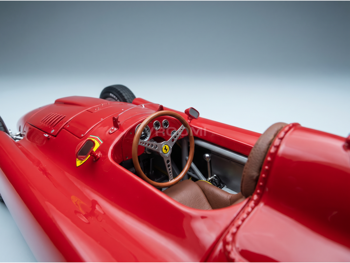 Red Ferrari scale model car interior with wood steering wheel, Vroomi