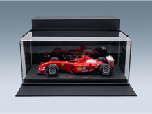 Ferrari F2001 scale model car, Michael Schumacher Monaco GP 2001 winner, displayed in Vroomi collector case