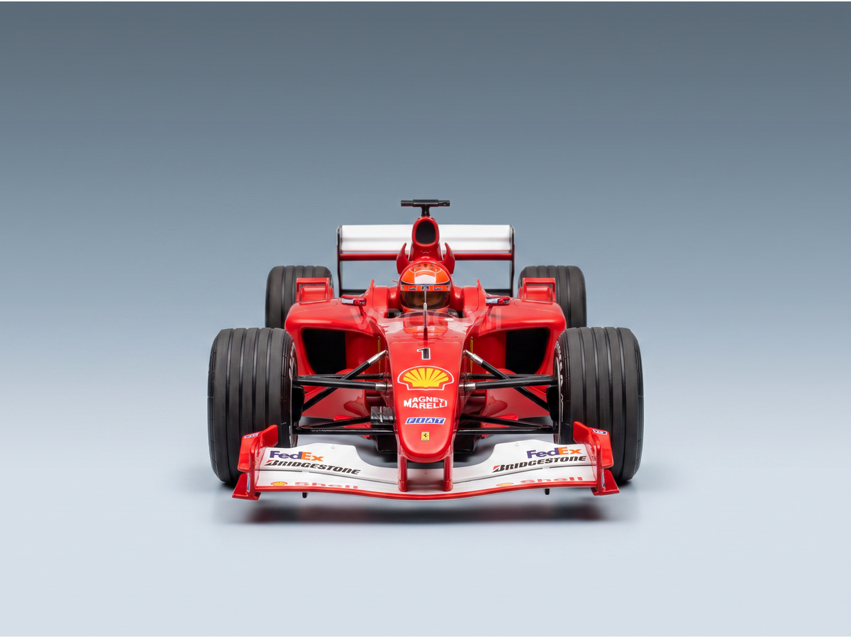 Red Ferrari F1 scale model car with Shell, FedEx, Bridgestone logos — Vroomi collector replica