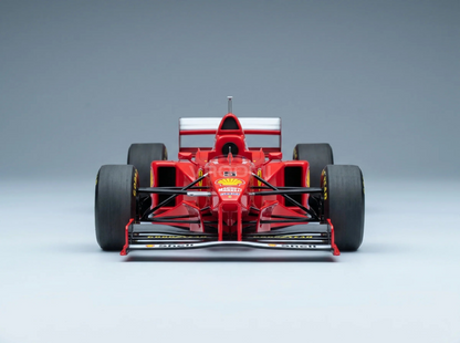 FERRARI - F1 F310B TEAM SCUDERIA FERRARI N. 5 VINCITORE DEL GP DEL GIAPPONE 1997 MICHAEL SCHUMACHER - ROSSO BIANCO Vroomi Scale modellini