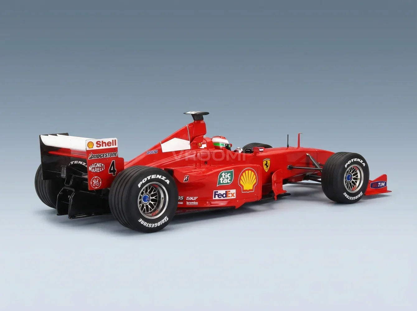 FERRARI - F1 F399 SCUDERIA FERRARI N° 4 VAINQUEUR DU GP DE MALAISIE (avec figurine du pilote) 1999 EDDIE IRVINE - ROUGE Vroomi - Boutique de modèles réduits de voitures
