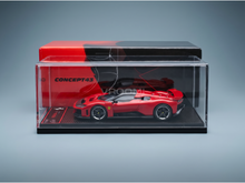 Red Ferrari scale model car in display case, Vroomi collection