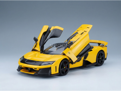 Yellow scale model car with open doors, showcased by Vroomi for collectors and fans.