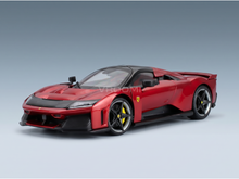 Maqueta de un Ferrari rojo con detalles en negro, presentada por Vroomi para coleccionistas