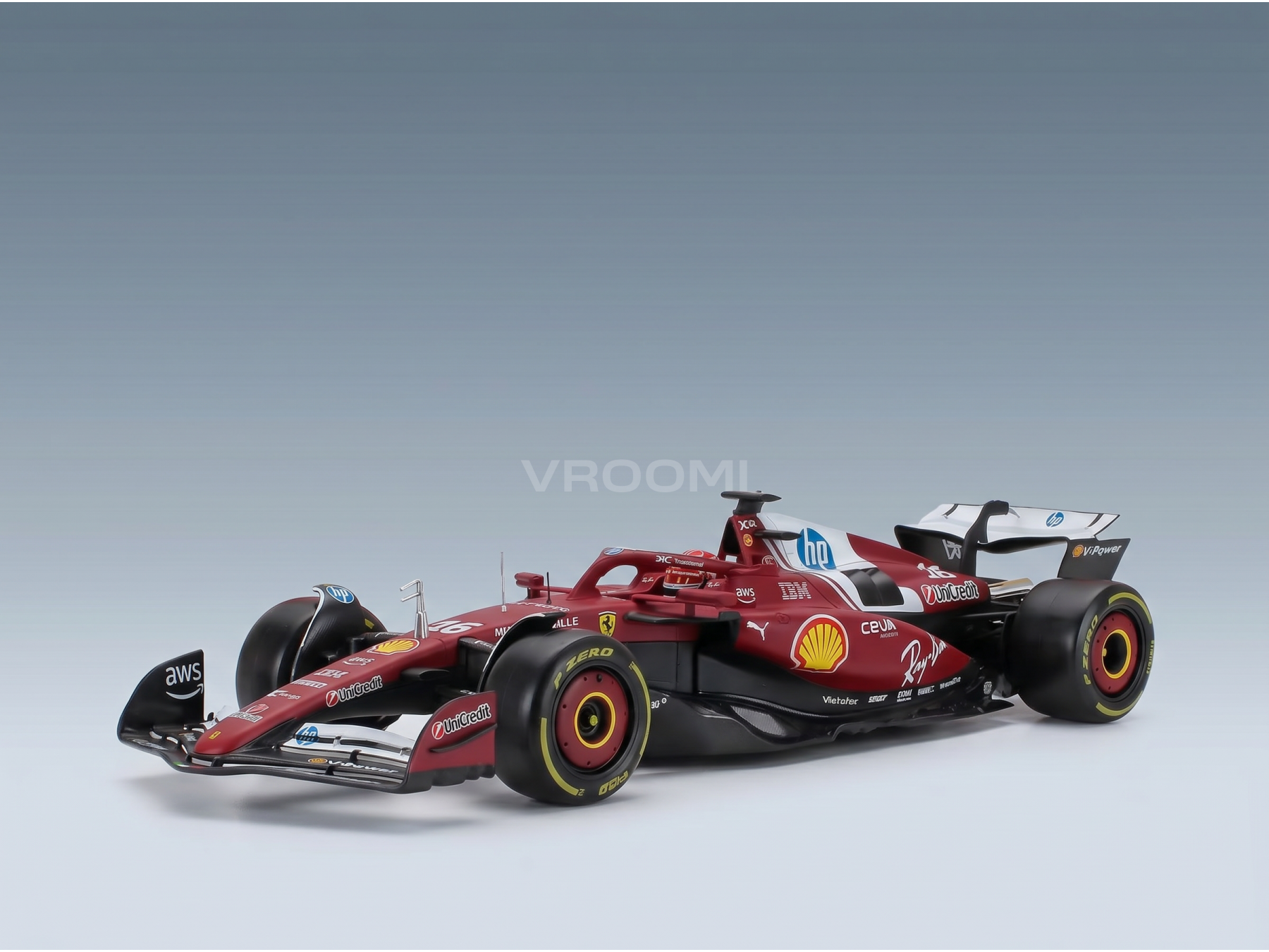 Maquette de voiture Ferrari rouge arborant les logos Shell et HP, présentée par Vroomi à l'intention des collectionneurs.
