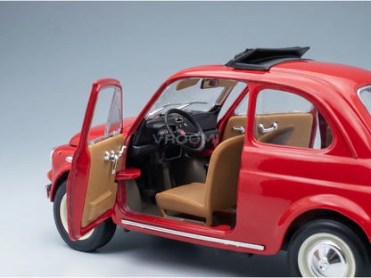 Coche a escala de color rojo con las puertas abiertas y el interior de color beige, expuesto por Vroomi para coleccionistas