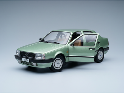 Green scale model car with open door, detailed interior, from Vroomi