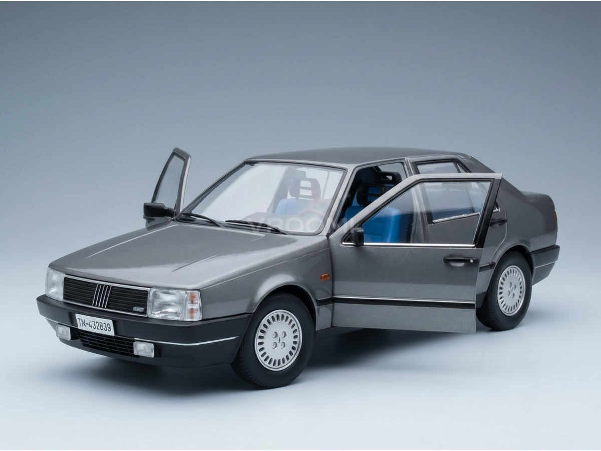 Gray scale model car with open doors, blue interior, displayed by Vroomi for collectors