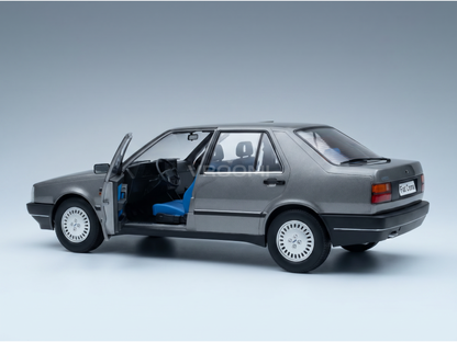 Silver Fiat Croma scale model car with open door, blue interior, at Vroomi