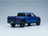 Voiture miniature Ford Raptor bleue par Vroomi, avec design die-cast détaillé et pneus tout-terrain.