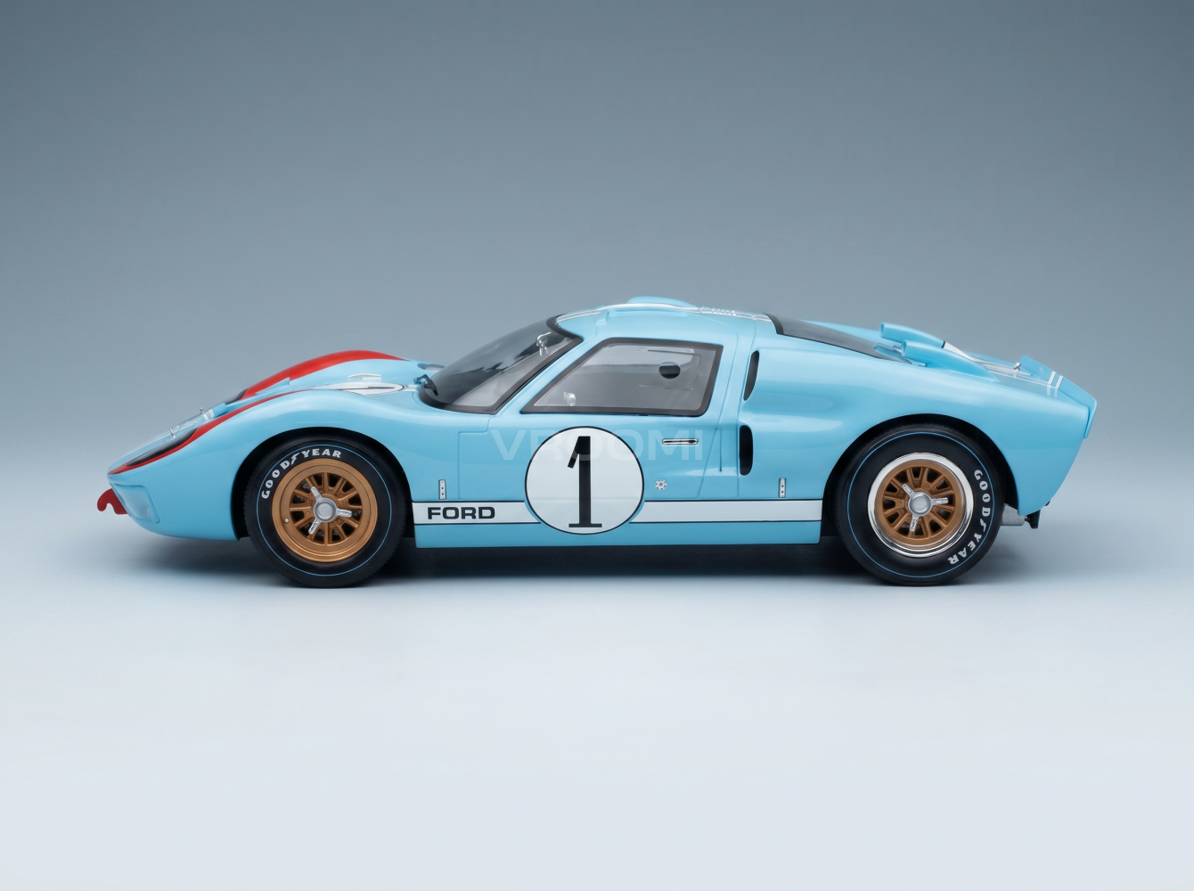 FORD EUA - GT40 MKII 7,0 L V8 TEAM SHELBY AMERICAN INC. N.º 1 2.º (MAS NA VERDADE VENCEDOR) 24 Horas de Le Mans 1966 KEN MILES - DENNY HULME - AZUL CLARO Modelo de carro em escala na Vroomi