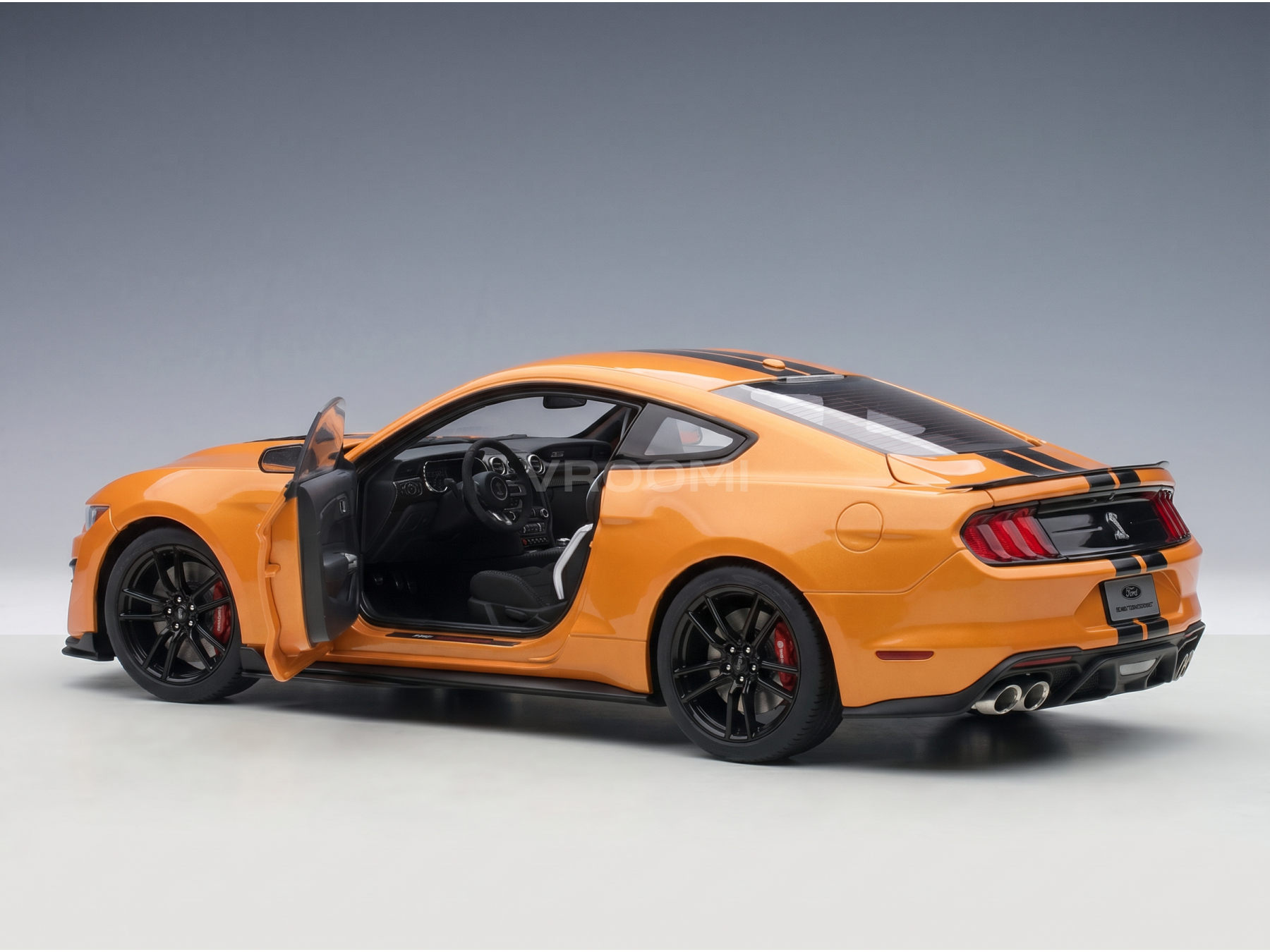 Orange Ford Mustang Shelby GT500 scale model car with open door, detailed interior, black stripes — Vroomi