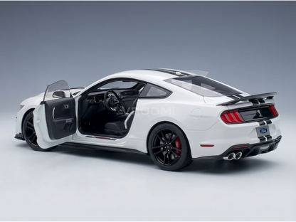 White Ford Mustang scale model car with open doors, showcased by Vroomi for collectors.