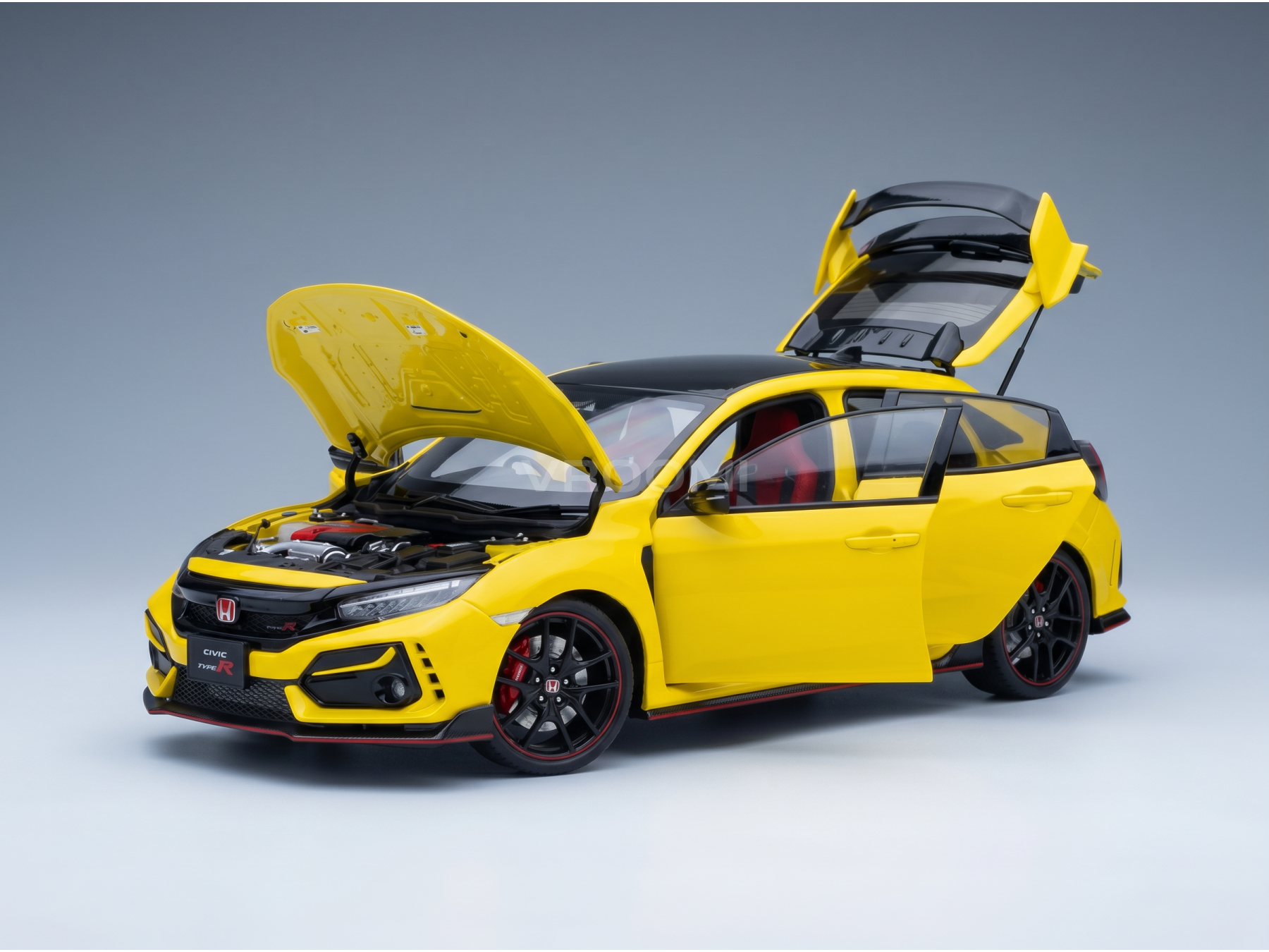 Yellow Honda Civic Type R scale model car with open doors and hood, showcased by Vroomi