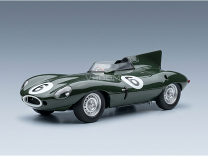 Groen vintage schaalmodel van een raceauto met nummer 6, gepresenteerd door Vroomi voor verzamelaars