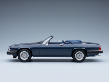 Blue Jaguar XJS convertible scale model car by Vroomi, showcasing detailed wheels and interior