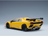 Voiture miniature Lamborghini jaune avec aileron arrière, présentée par Vroomi pour les collectionneurs