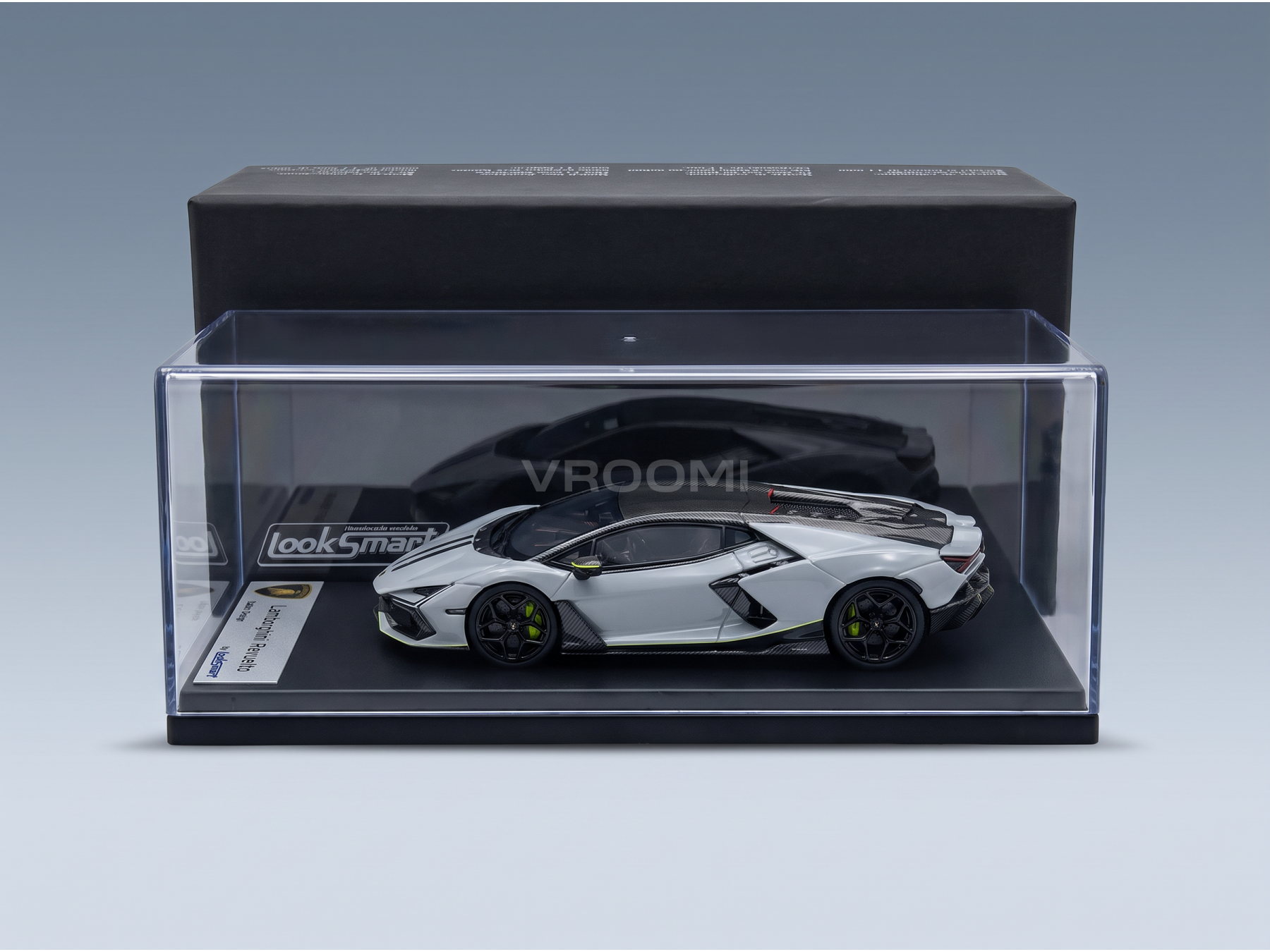 Silver Lamborghini Revuelto scale model car in clear display case by LookSmart, curated by Vroomi for collectors.