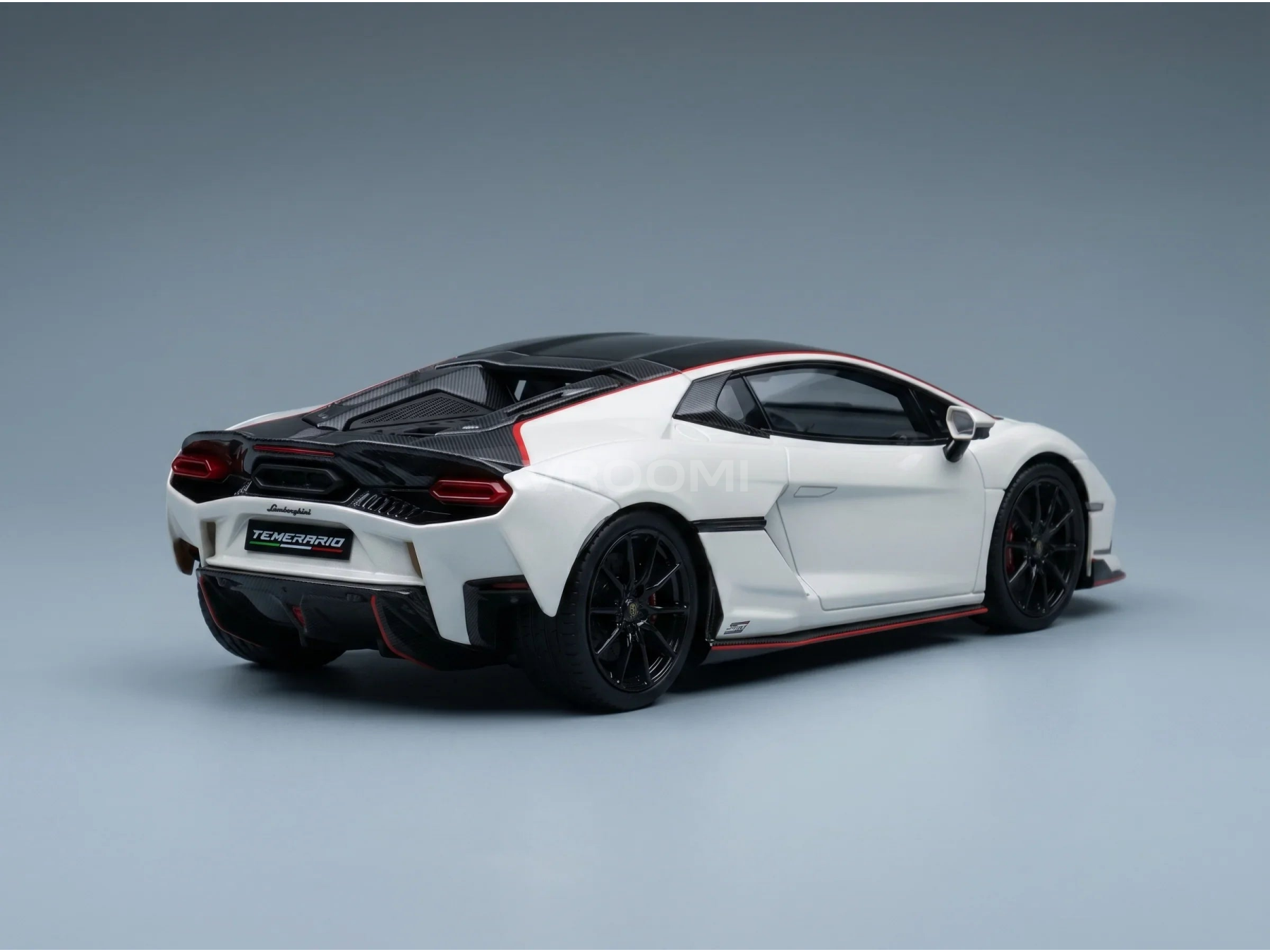 Wit schaalmodel van de Lamborghini Temerario met zwarte accenten, gepresenteerd door Vroomi voor verzamelaars.