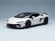 White Lamborghini Huracán scale model car with black accents, showcased by Vroomi for collectors