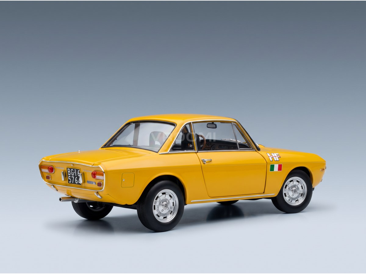 Yellow scale model car with Italian flag decal, showcased by Vroomi for collectors