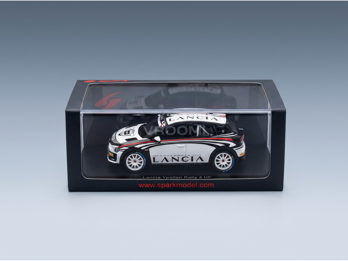 Voiture miniature die-cast Lancia Ypsilon HF Rally4 2025 blanche et noire avec bandes racing rouges, vue avant-côté