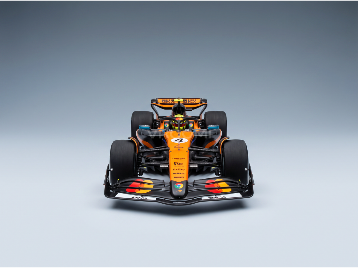 Miniature de la McLaren F1 MCL39 orange et noire avec décalcomanies sponsors, Champion du Monde et vainqueur du GP de Monaco 2025 Lando Norris