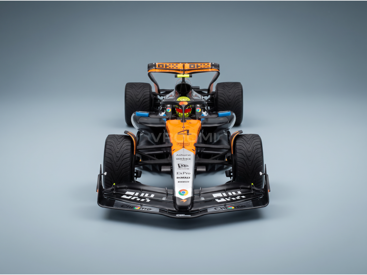 Miniature de la McLaren F1 MCL39 orange et noire avec décalcomanies sponsors du GP de Grande-Bretagne 2025 avec Lando Norris