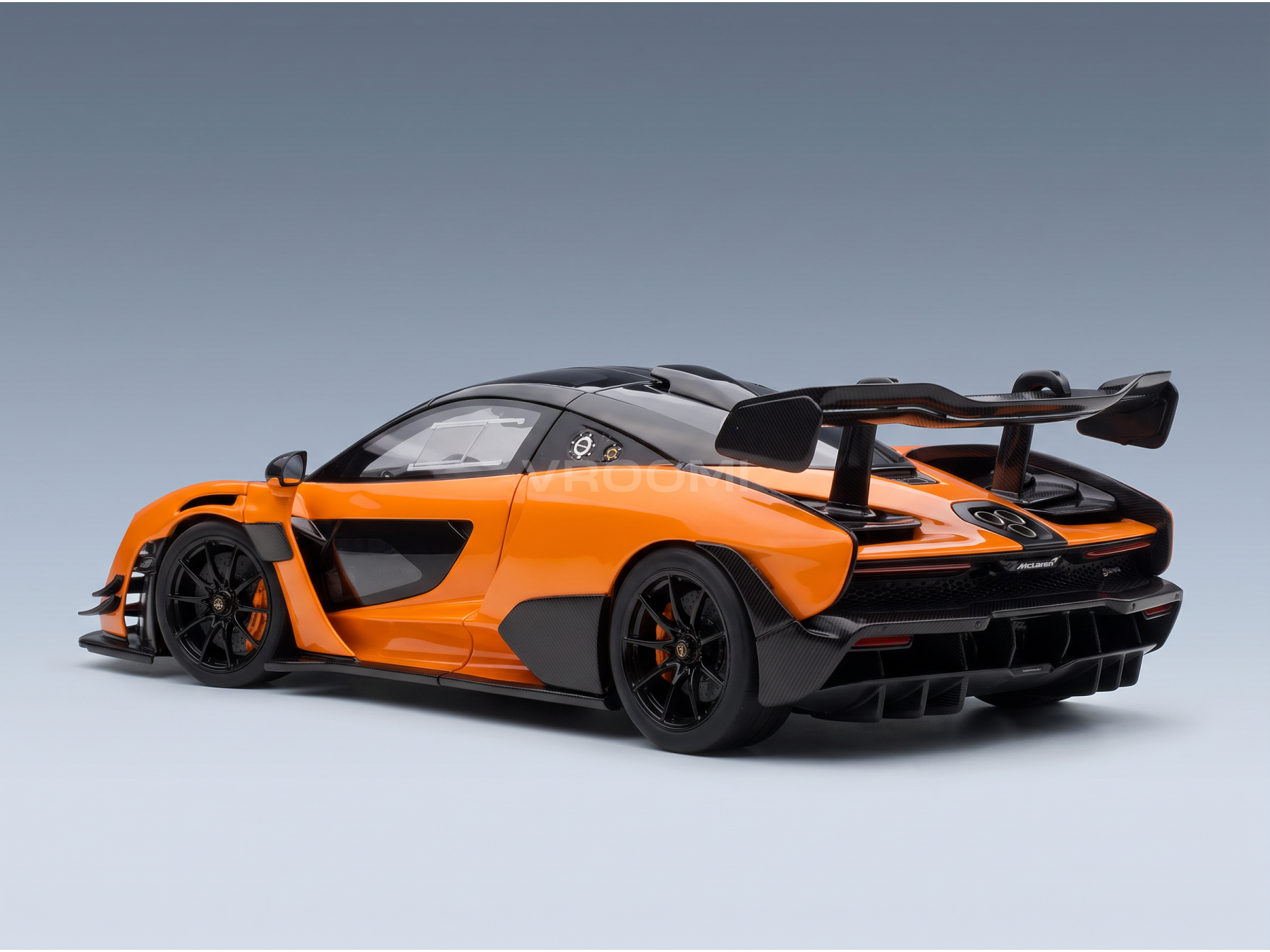 Vroomi orange McLaren Senna scale model car with carbon fiber details and rear wing
