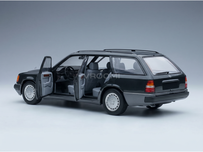 Black Mercedes-Benz W124 Estate scale model car with open doors, detailed interior, at Vroomi