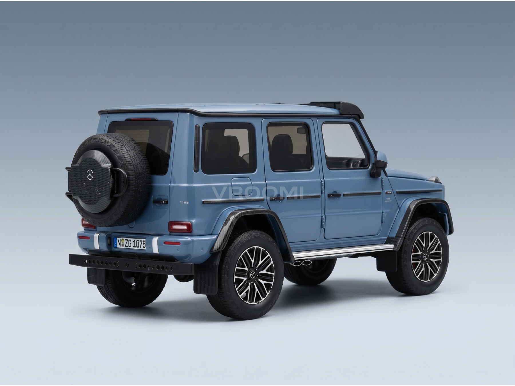 Blue Mercedes-Benz G-Wagon scale model car with spare tire, showcased by Vroomi for collectors.