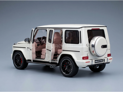 White Mercedes-AMG G63 scale model car with open doors, detailed interior, and Vroomi branding