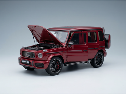 Red Mercedes-AMG G63 scale model car with open hood, showcased by Vroomi for collectors.