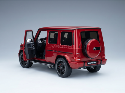 Red Mercedes-AMG G63 scale model car with open doors, showcased by Vroomi for collectors.