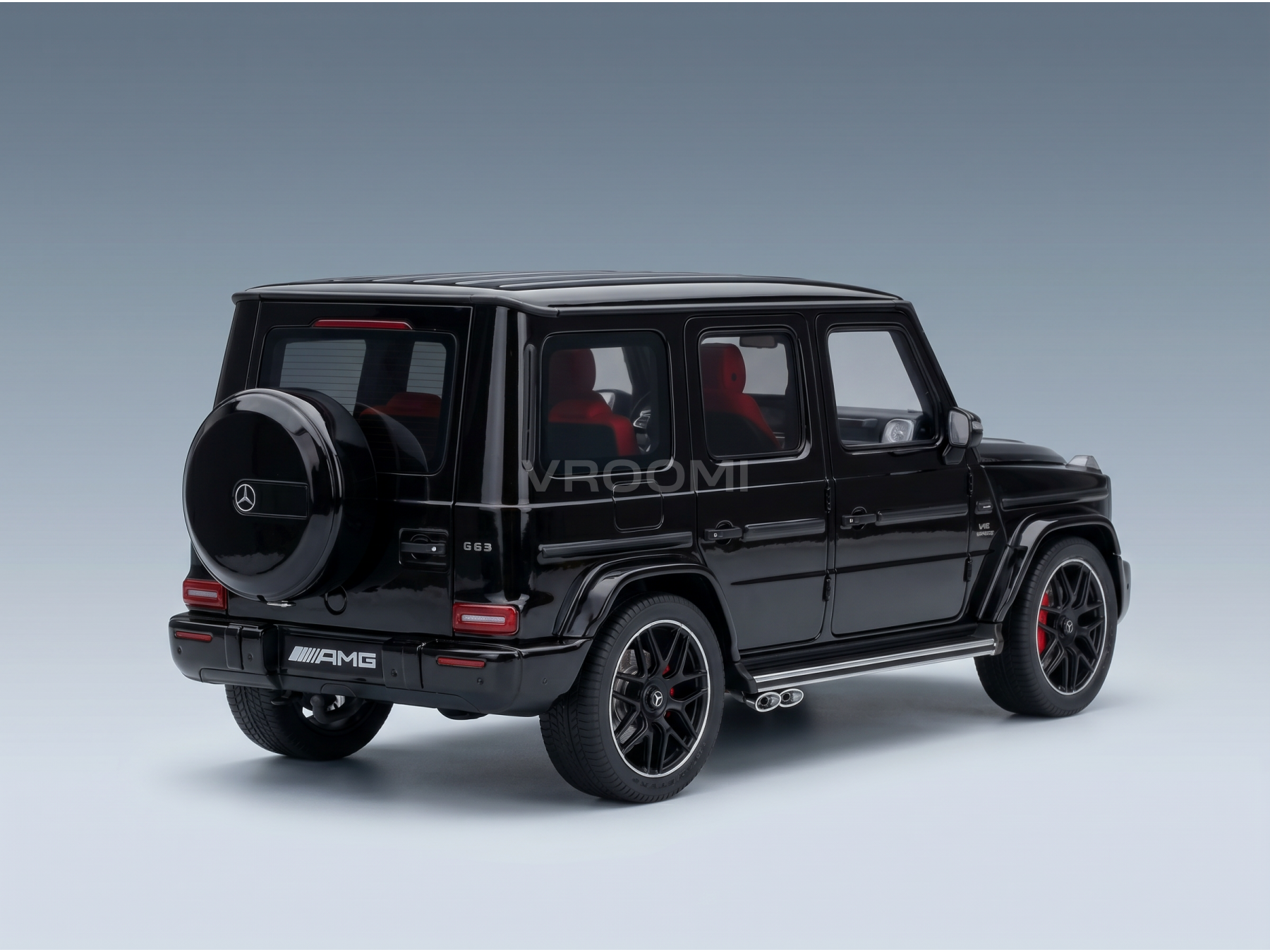 Black Mercedes-AMG G63 scale model car from Vroomi, featuring red interior and detailed design.