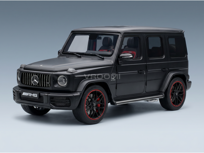 Black Mercedes-AMG G63 scale model car with red accents, showcased by Vroomi for collectors.