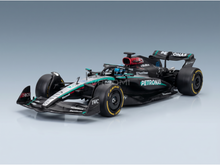 Mercedes-AMG Petronas F1 scale model car from Vroomi, detailed die-cast replica with Pirelli tires and sponsor decals.