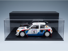 Peugeot 205 T16 Rallye scale model car in display case, Vroomi collector's edition with Shell and Michelin livery