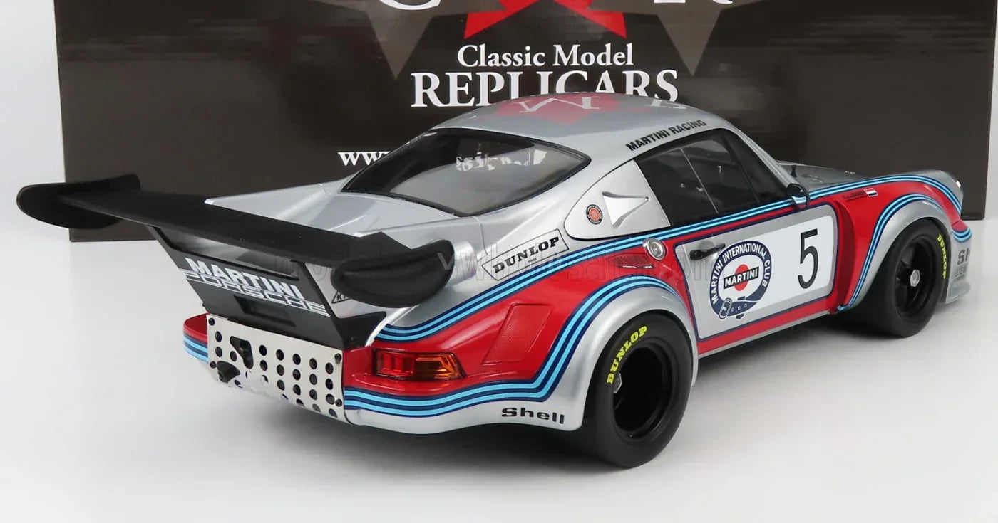 PORSCHE - 911 930 CARRERA RSR TURBO 2,1 L TEAM MARTINI RACING N° 5 BRANDS HATCH 1974 H. MULLER - G. VAN LENNEP - ARGENT, ROUGE, BLEU Boutique de modèles réduits Vroomi