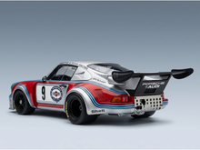 Martini-liveried Porsche 911 RSR scale model car with racing decals, showcased by Vroomi for collectors.