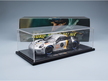 Porsche 911 GT3 R scale model car in display case, Vroomi collector's edition with Michael Fassbender livery