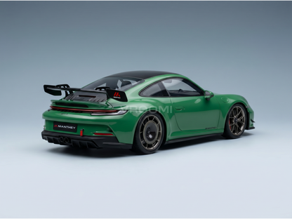 Green Manthey Porsche 911 GT3 scale model car from Vroomi, featuring rear wing and detailed rims.