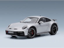 Silver Porsche 911 scale model car with black rims, showcased by Vroomi for collectors.