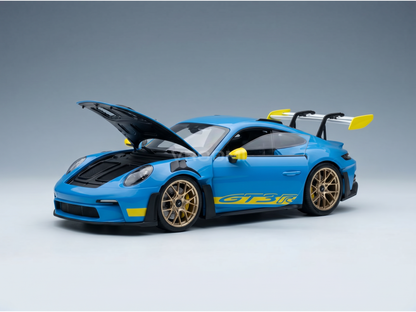 Blue Porsche GT3 R scale model car with open hood, gold wheels, yellow accents — Vroomi