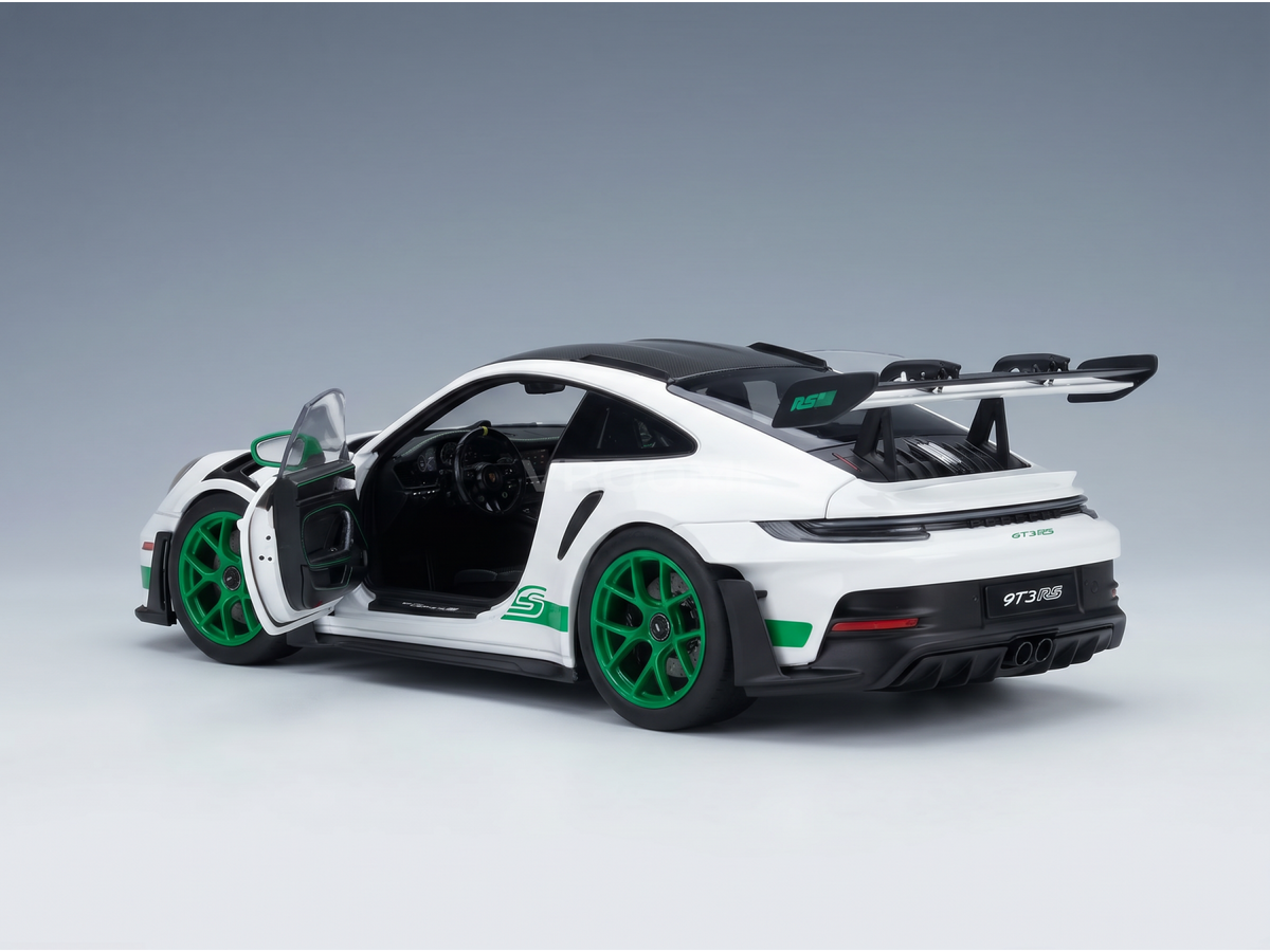 White Porsche 911 GT3 RS scale model car with green accents, open door, and Vroomi branding