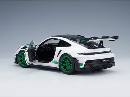 White Porsche 911 GT3 RS scale model car with green accents, open door, and Vroomi branding