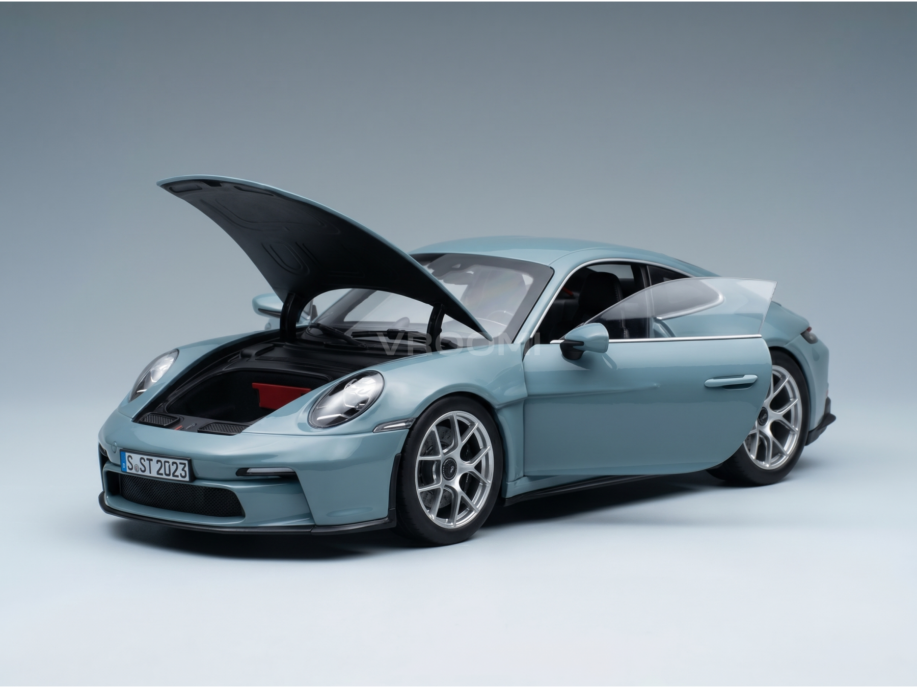 modellino in scala di una Porsche 911 azzurra modellino cofano e portiera aperti, motore dettagliato, Vroomi